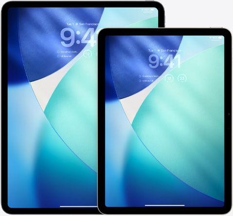 iPad Pro and iPad Air, side-by-side, iPad Air in front overlapping iPad Pro, portrait orientation, Lock Screen shows time in translucent Liquid Glass