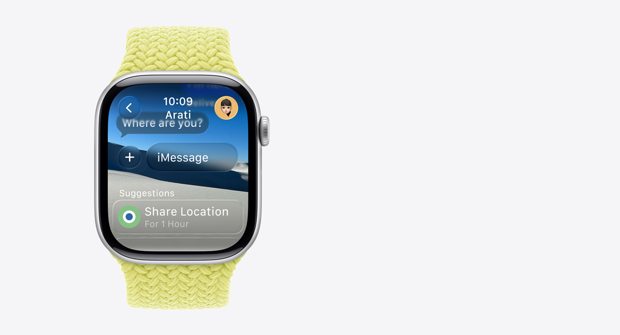 Apple Watch in Silver, with a braided strap in yellow, translucent message on screen says “Where are you?” the word “Suggestions” is below with a Smart Action that says “Share Location for 1 hour”