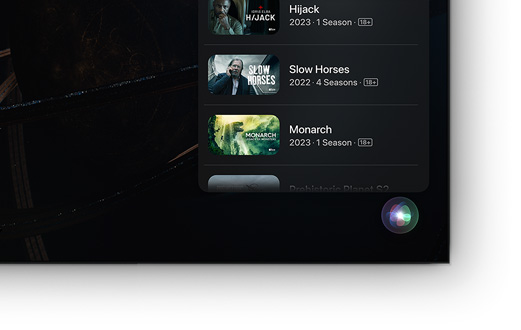 تلفزيون بشاشة مسطحة يعرض قائمة بأفلام وبرامج +Apple TV‏