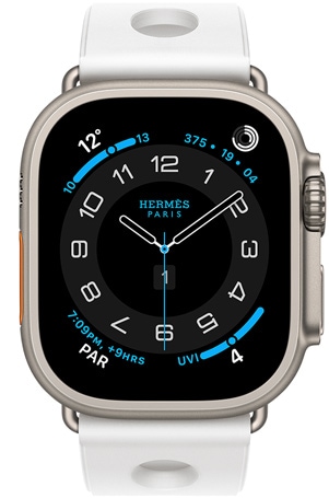 Apple Watch Hermès Ultra 3‏ بإطار من التيتانيوم الطبيعي، وواجهة الساعة Hermès Circulaire، الإضافات: الطقس، وحلقات النشاط، والوقت في باريس، ومؤشر الأشعة فوق البنفسجية، وحزام Scub'H Diving‏، لون blanc‏