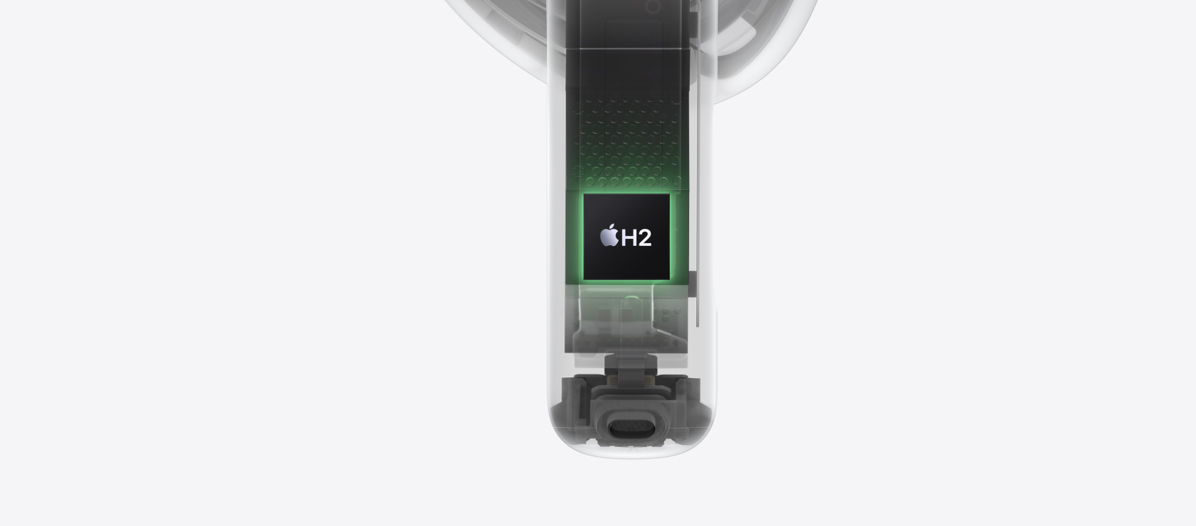 H2-chippet visas inuti skaftet på en AirPods 4-snäcka.