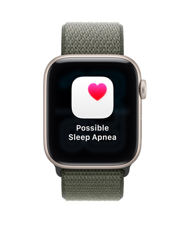 Apple Watch SE 3, aluminum case, starlight color, possible sleep apnea notification, pink heart in white box, right side exterior, Digital Crown, Sport Loop, forest color