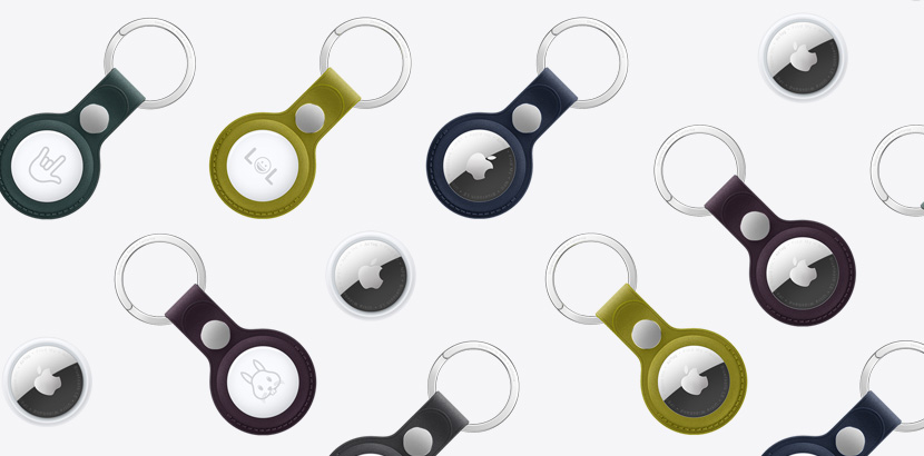 An array of AirTags and AirTags with FineWoven Key Ring in various colors including Chartreuse, Dark Green, Deep Blue, Blackberry, and Black.